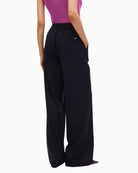 Back view showing straight-leg fit and soft drape