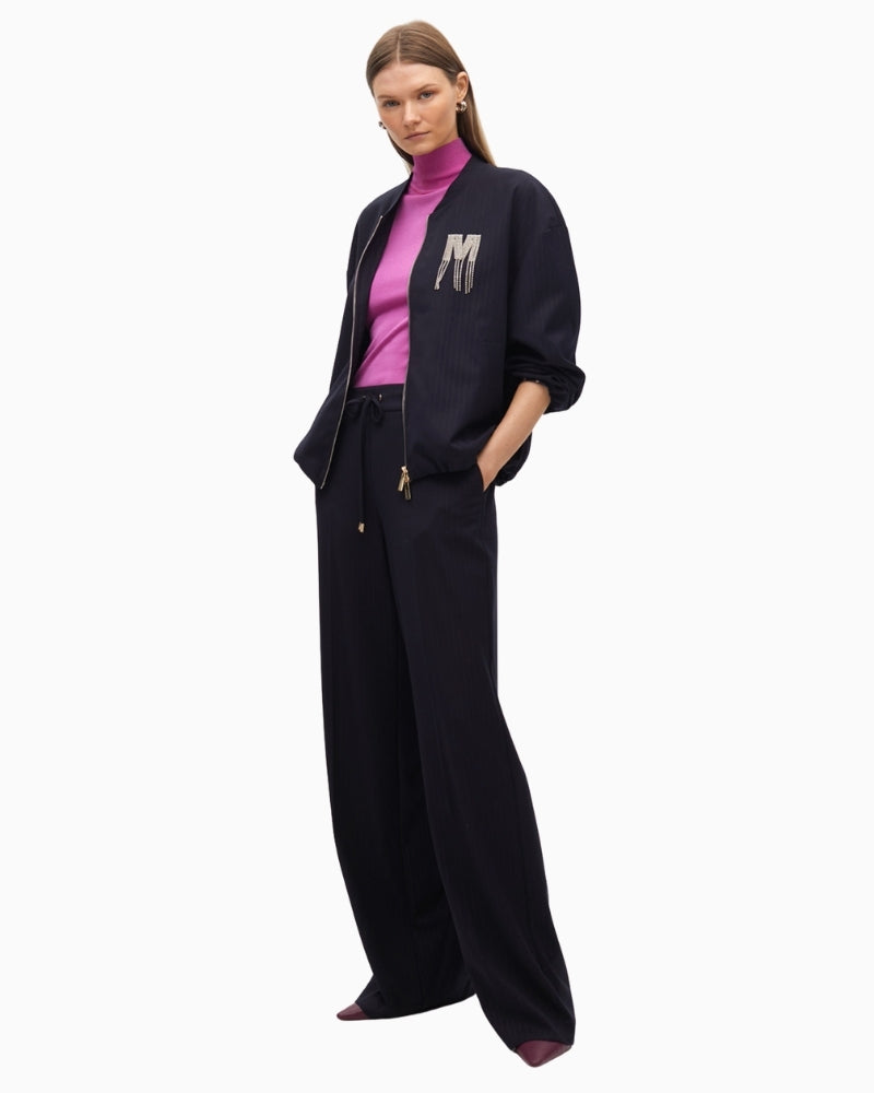 Side view showing straight-leg fit and soft drape