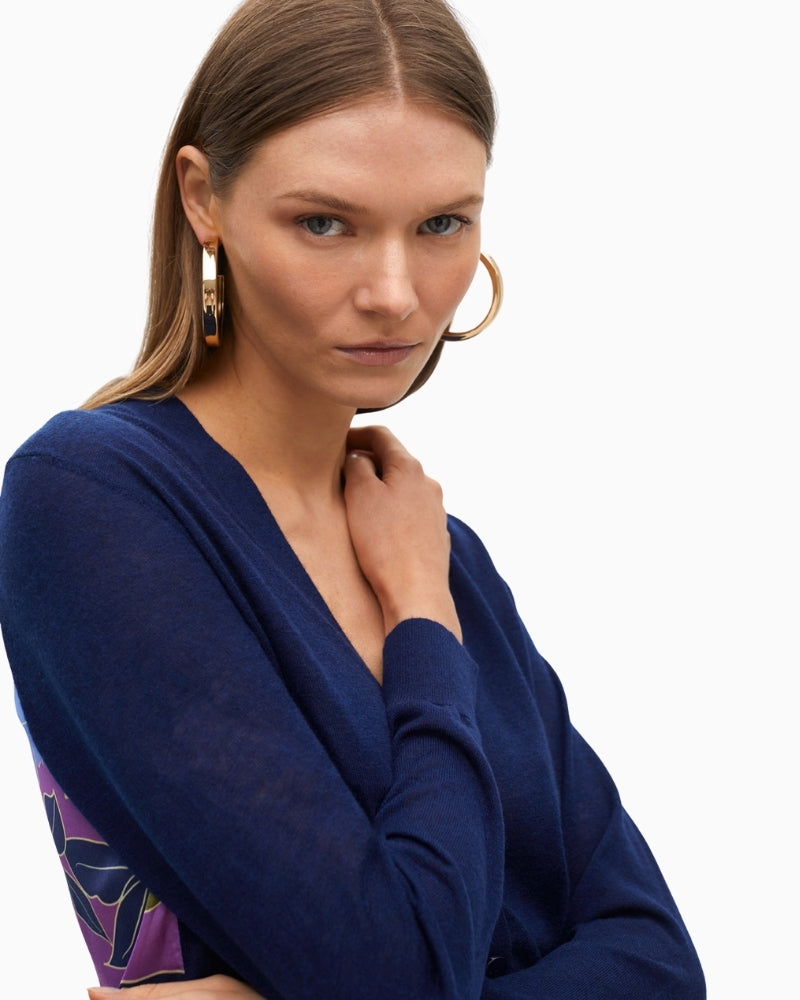 Close-up of soft knit fabric and floral detail at back