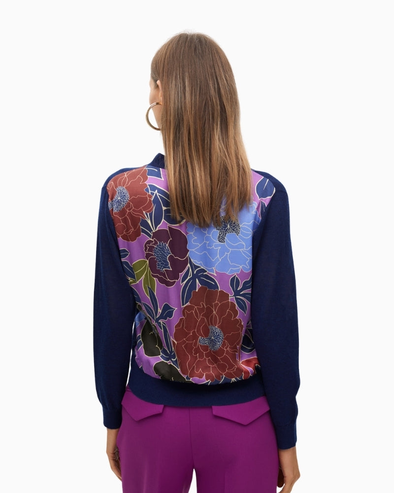 Back view showing vibrant floral print on fine knit cardigan