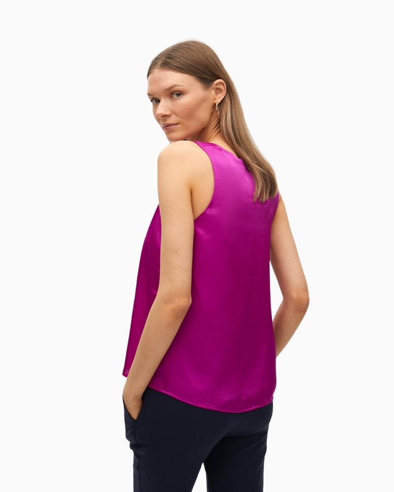 Back view showing relaxed straight cut and sleeveless shape