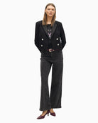 Cropped structured jacket with bold lapel and tailored shape