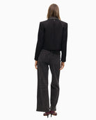 Back view of blazer showing printed collar and decorative button detail