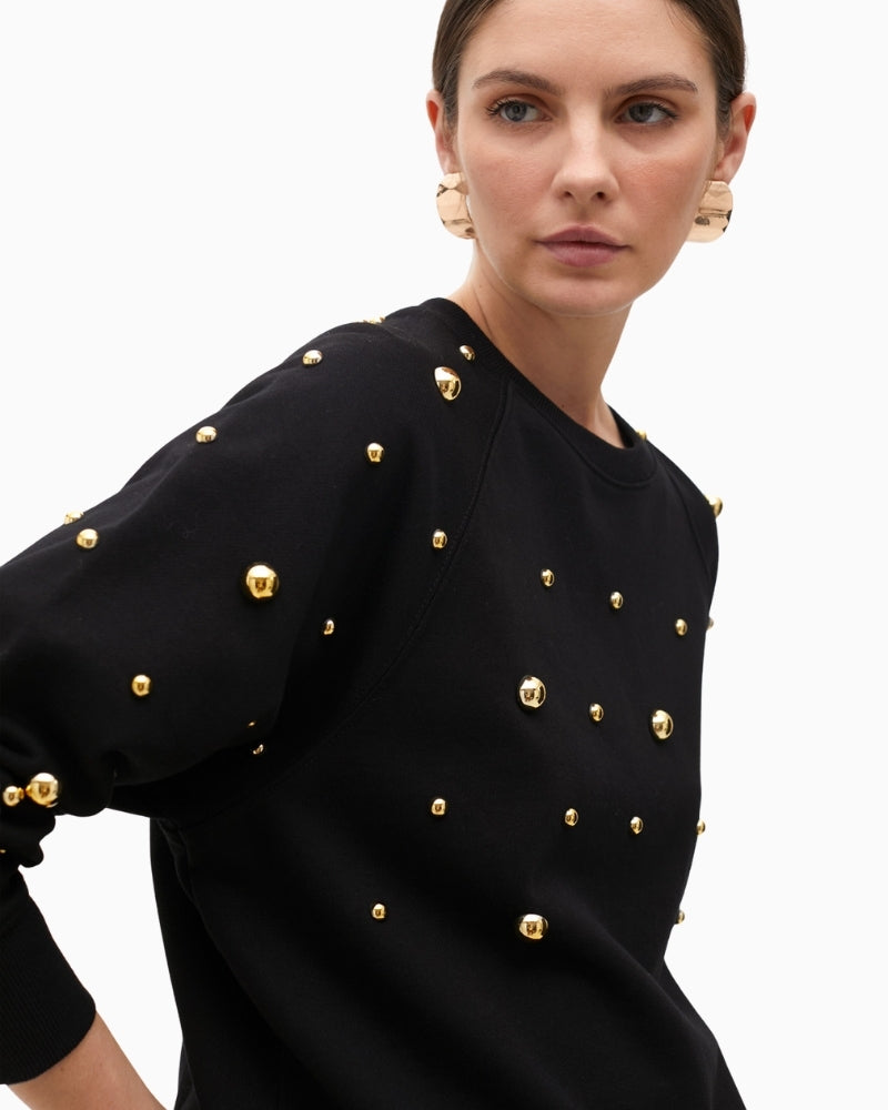 Soft cotton sweatshirt with long sleeves and modern embellishment