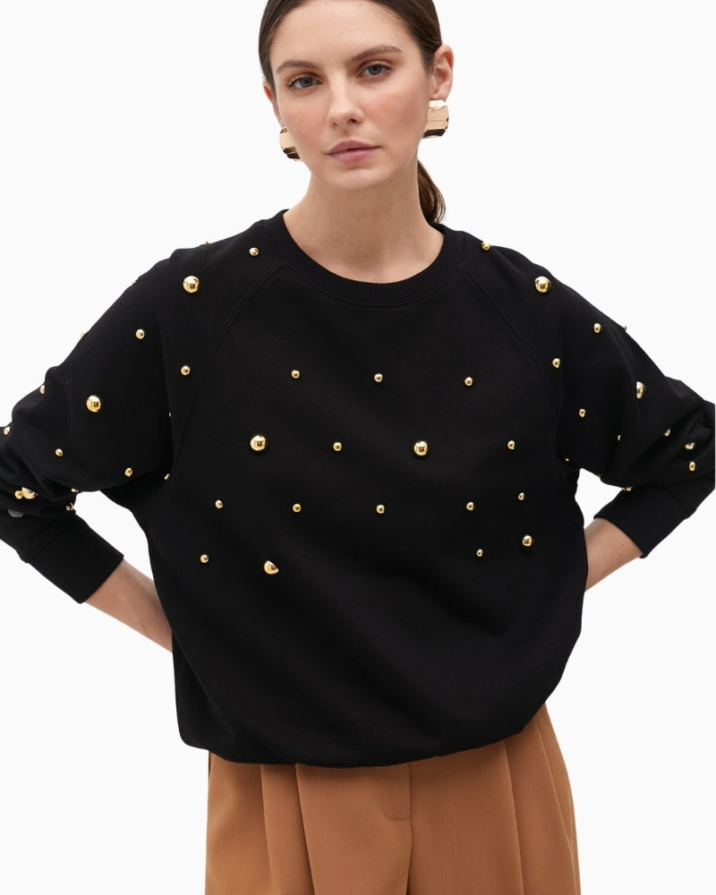 Soft cotton sweatshirt with long sleeves and modern embellishment