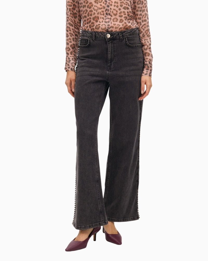 Front view of Lola Casademunt grey wide-leg jeans with stud detail