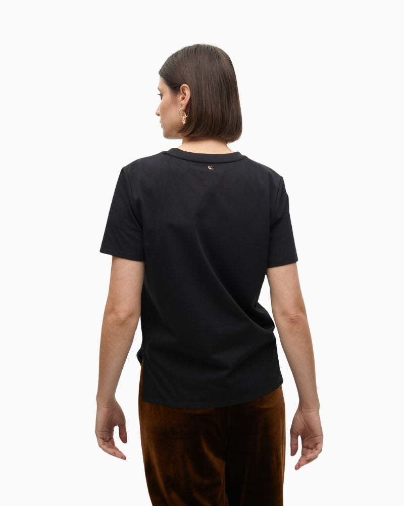 Back view showing straight cut and short sleeve design