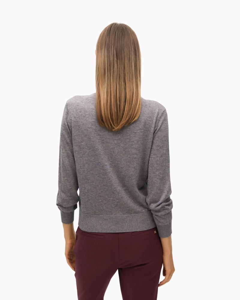 Back view showing relaxed fit and long sleeves