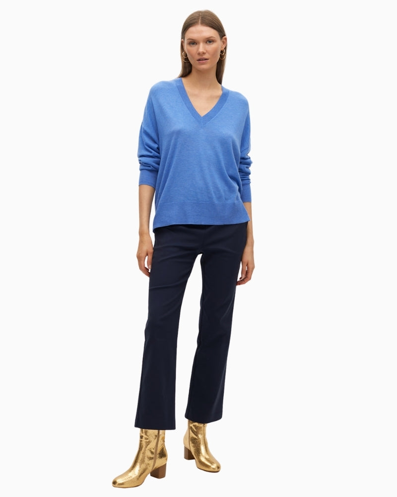 Front view of Lola Casademunt soft blue V-neck jumper with relaxed fit