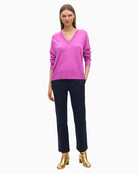 Lola Casademunt V-neck jumper styled with jeans for a cosy casual look