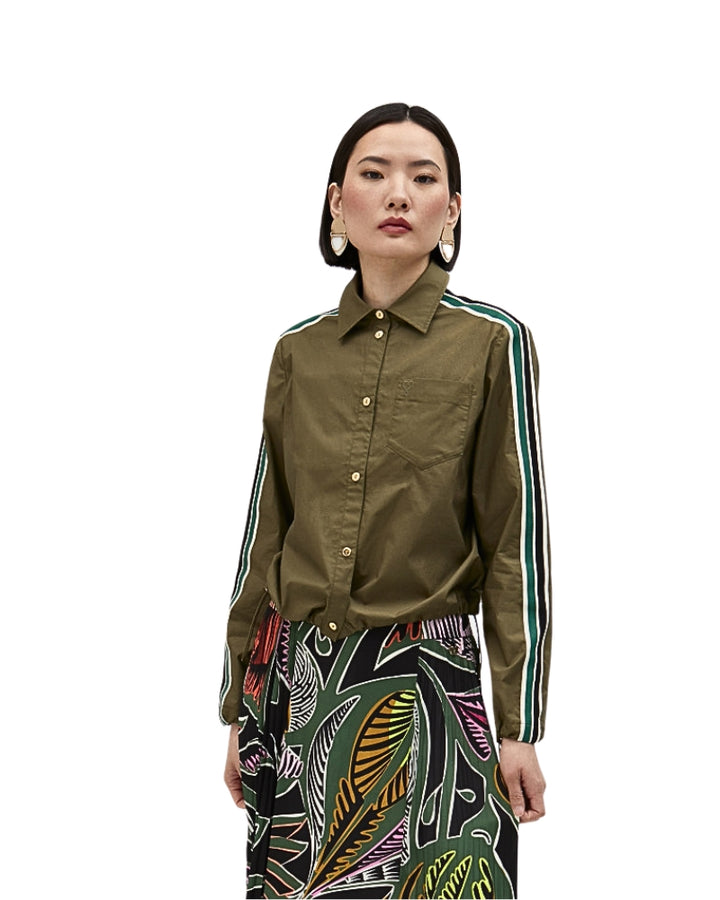 Lola Casademunt poplin shirt styled with patterned trousers for a bold look