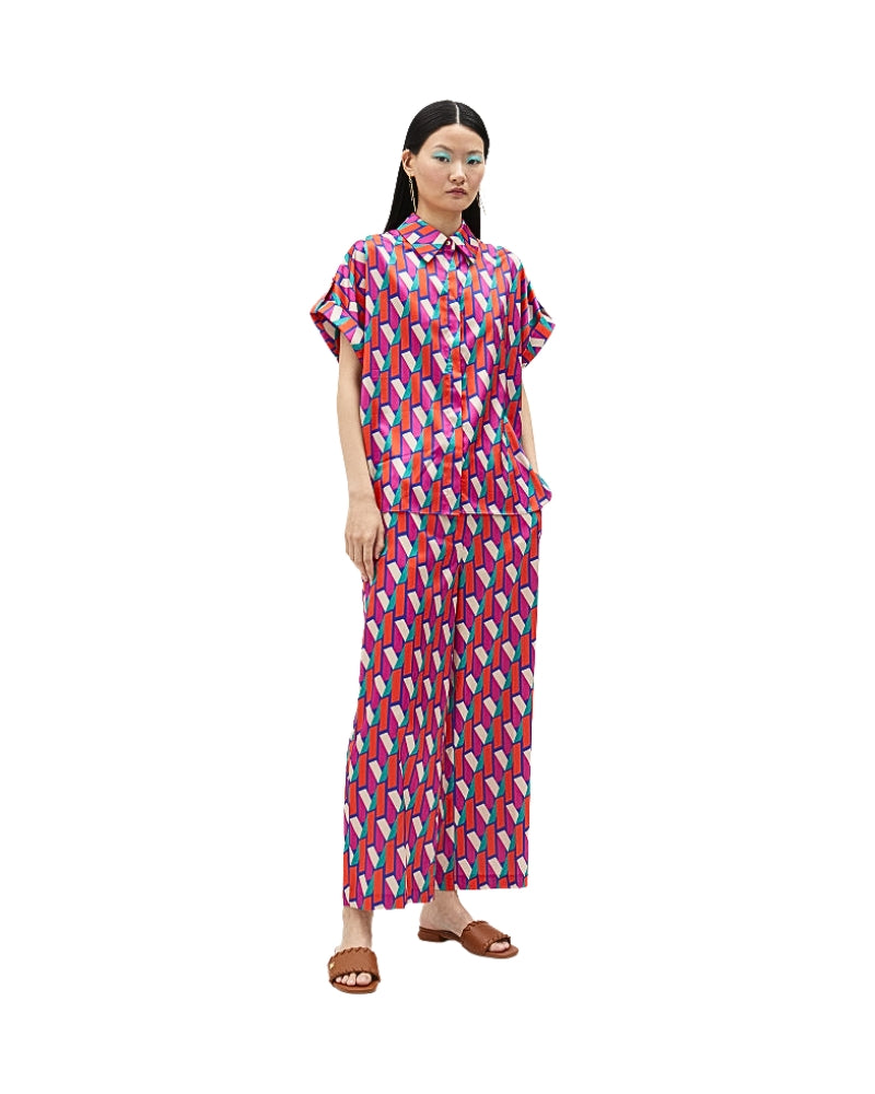 Front view of relaxed-fit logo printed shirt styled for a statement look