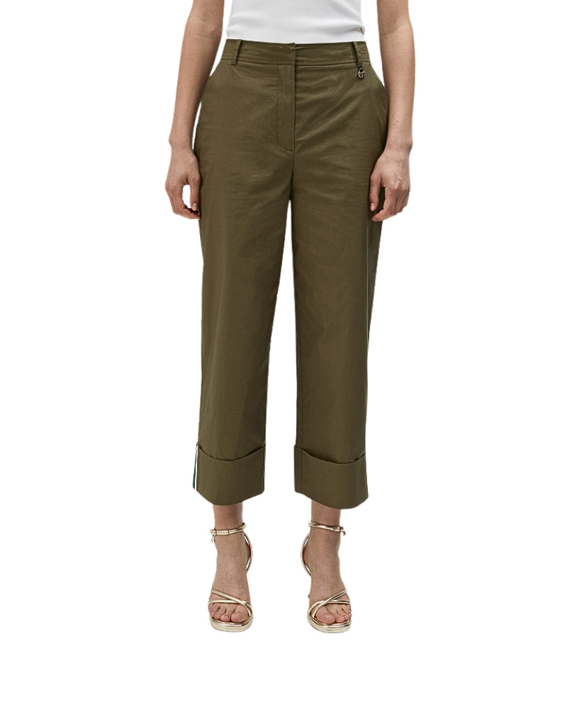 Model wearing Lola Casademunt olive green poplin trousers with cropped turn-up hems