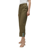 Side view of Lola Casademunt trousers showing relaxed fit and cropped length