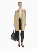 Lola Casademunt Oversize Shirt with Studs in white styled under beige coat