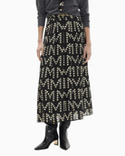 Lola Casademunt Pleated Logo Print Skirt in Black/White front view