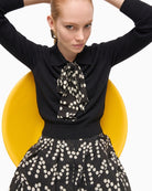 Lola Casademunt Pleated Logo Print Skirt in Black/White styled view
