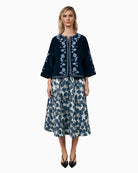 Woman wearing Lollys Laundry Amby blue velvet jacket – Áines Boutique