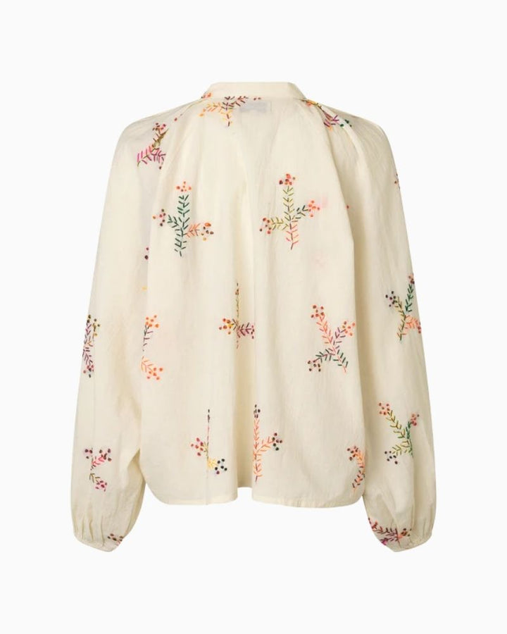 Back of embroidered cotton shirt with raglan sleeves and elasticated cuffs