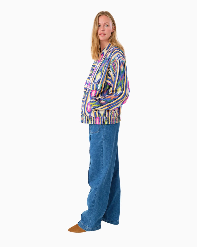 Side view showing jacket length and sleeve shape