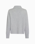 Back of women’s indoor jacket showing slim fit and clean lines