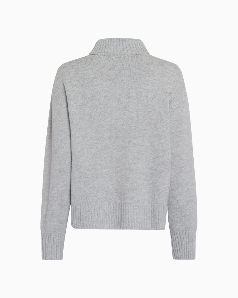 Back of women’s indoor jacket showing slim fit and clean lines