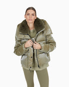 Front view of Marc Aurel shimmer puffer jacket with faux fur hood and zip pockets