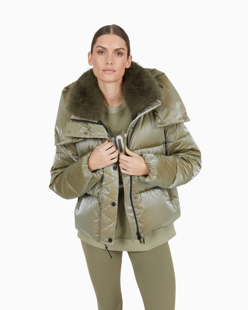 Front view of Marc Aurel shimmer puffer jacket with faux fur hood and zip pockets
