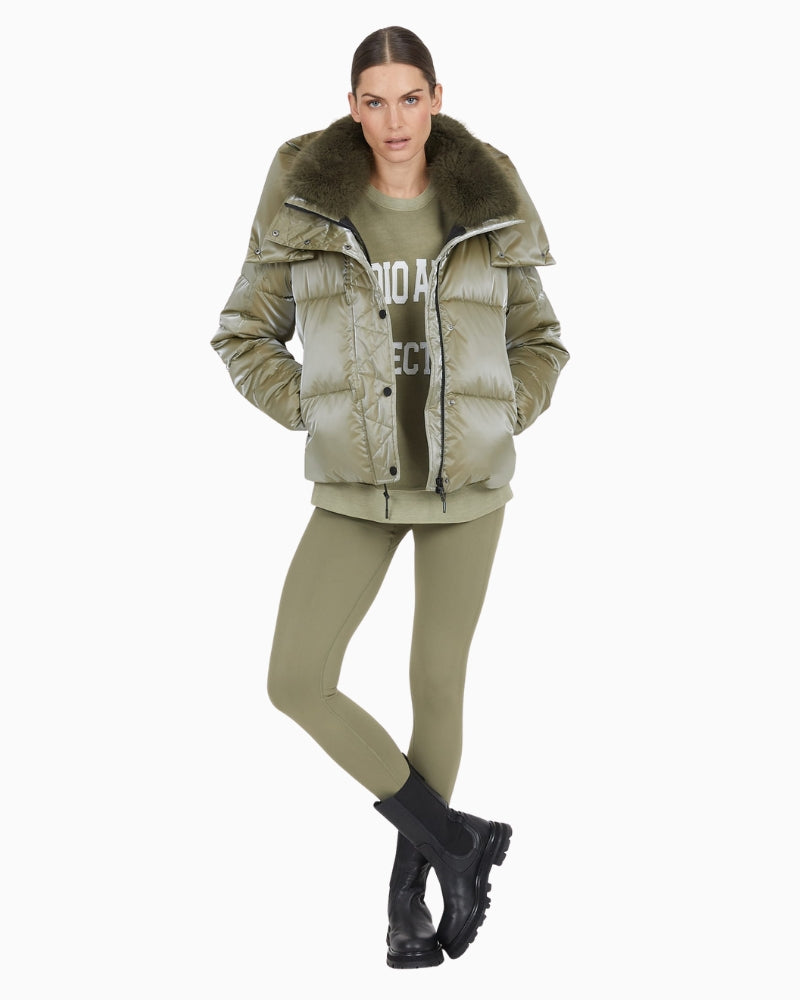 Front view of Marc Aurel shimmer puffer jacket with faux fur hood and zip pockets