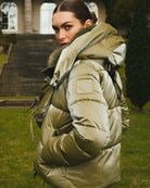 Side view showing shiny satin-look fabric and flattering quilted fit