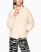 Cream animal print jacket with zip front and ribbed sleeves