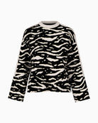Front view of ribbed cotton top by Marc Cain with bold animal print
