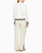 Back view of jumper showing soft stretch fabric in contrast texture