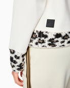 Close-up of alpaca and wool knit texture on front and cuffs