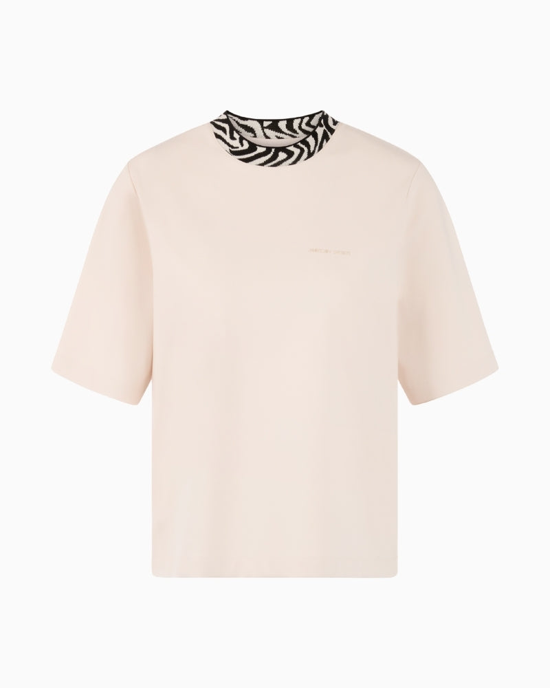 Front view of straight-cut Marc Cain tee with Sport logo detail