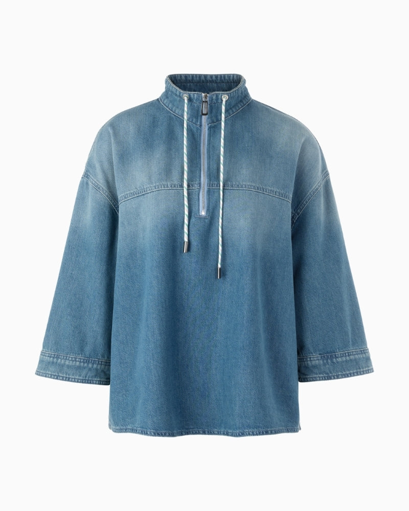 Marc Cain blue denim-style blouse front view with zip neckline – Áines Boutique
