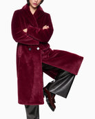 Front view of Marc Cain fluffy maroon coat with wide fit and four-button fastening