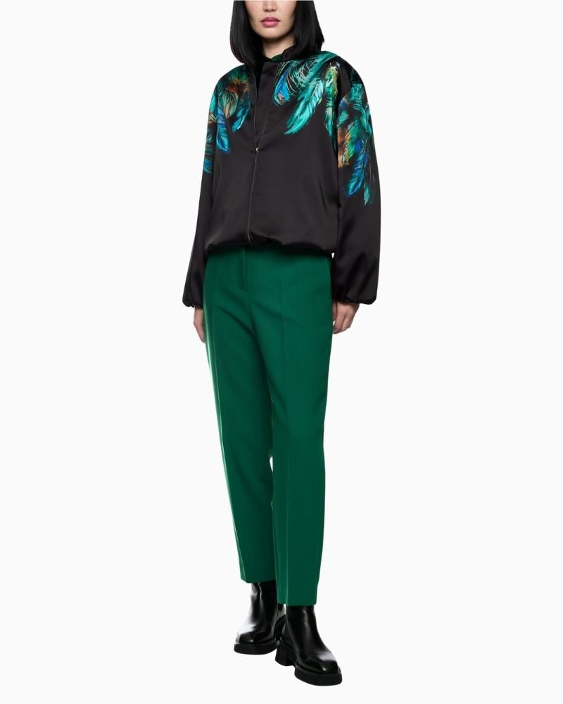 Model wearing Marc Cain FORDON 7/8 trousers styled with blazer and loafers