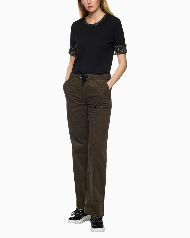 Marc Cain black jersey shirt with printed trim at neckline and rolled sleeves