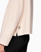 Soft cotton-blend jumper with relaxed shape and elegant finish