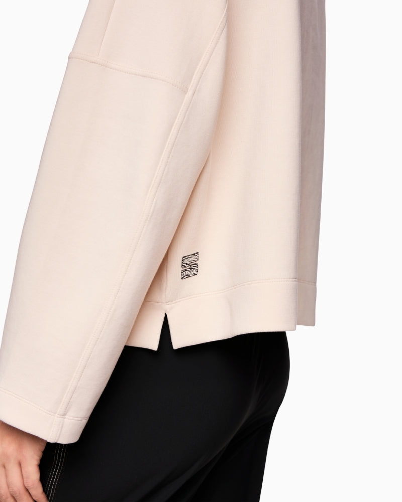 Soft cotton-blend jumper with relaxed shape and elegant finish