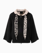 Front view of loose-fit Marc Cain knit cardigan with zip fastening