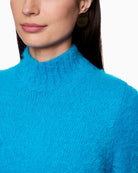 Rethink Together knitwear by Marc Cain in wool blend with fluffy finish