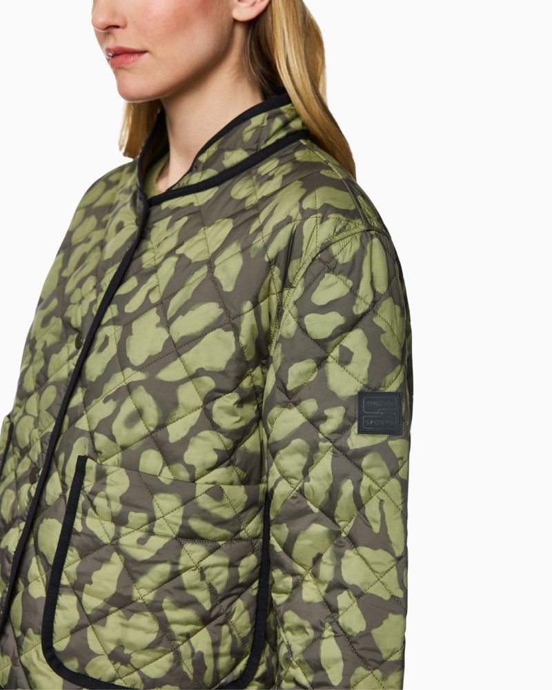 Close up of Reversible quilted jacket by Marc Cain in olive with leopard print side