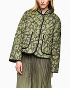 Reversible quilted jacket by Marc Cain in olive with leopard print side
