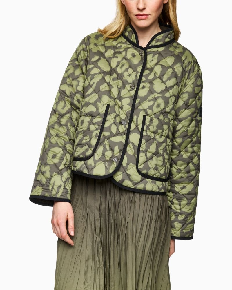 Reversible quilted jacket by Marc Cain in olive with leopard print side
