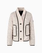 Front view of boxy short jacket with ribbed knit collar and button fastening