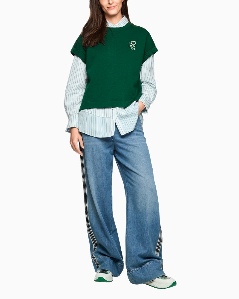 Woman wearing Marc Cain green shirt full outfit – Áines Boutique