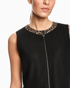 Close-up of virgin wool texture and tailored faux pocket detail