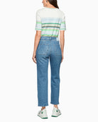 Woman wearing Marc Cain straight leg denim pants back view – Áines Boutique